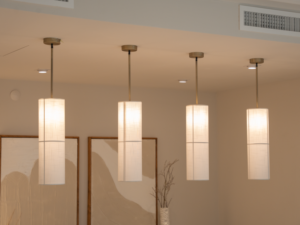 Elegant modern pendant lights enhancing a minimalist home interior design.